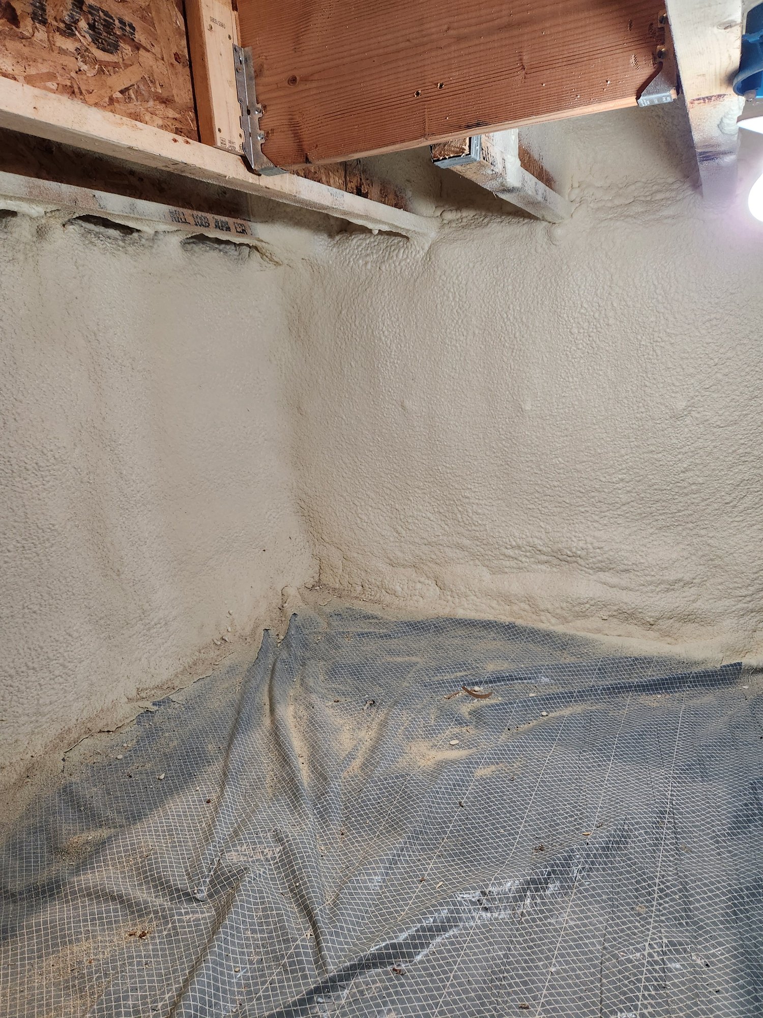 Crawl Space Spray Foam Insulation installation in progress