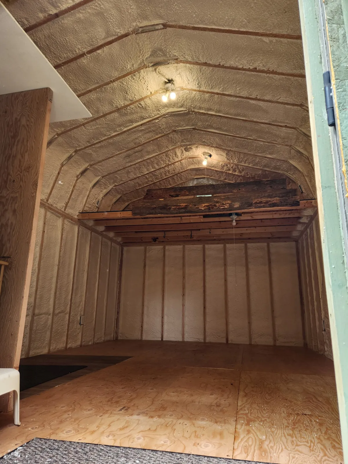 Spray foam insulation inside a Montana shop building, an example of the work Peak Insulation provides for homes and shops in the Kalispell, Montana service area