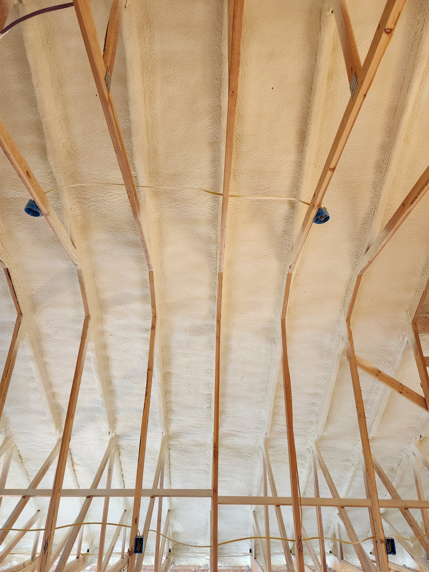 Spray foam insulation being applied in a Montana home