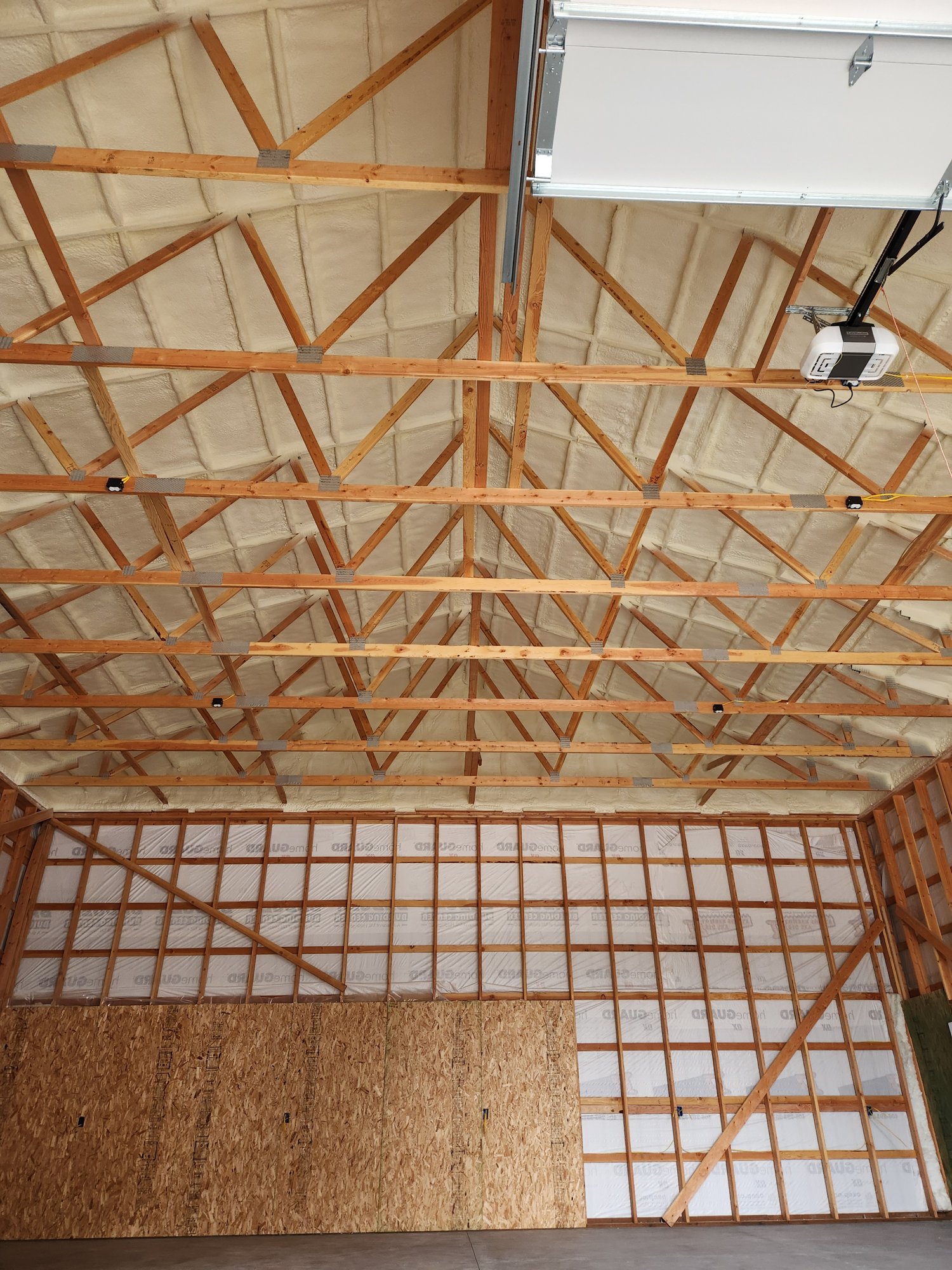 Closed-cell spray foam applied to a commercial pole barn in Northwest Montana